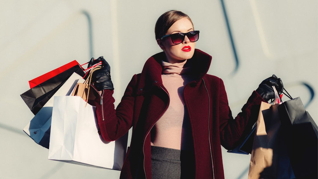 beautiful woman with red lipstick wearing red overcoat wearing AYRA