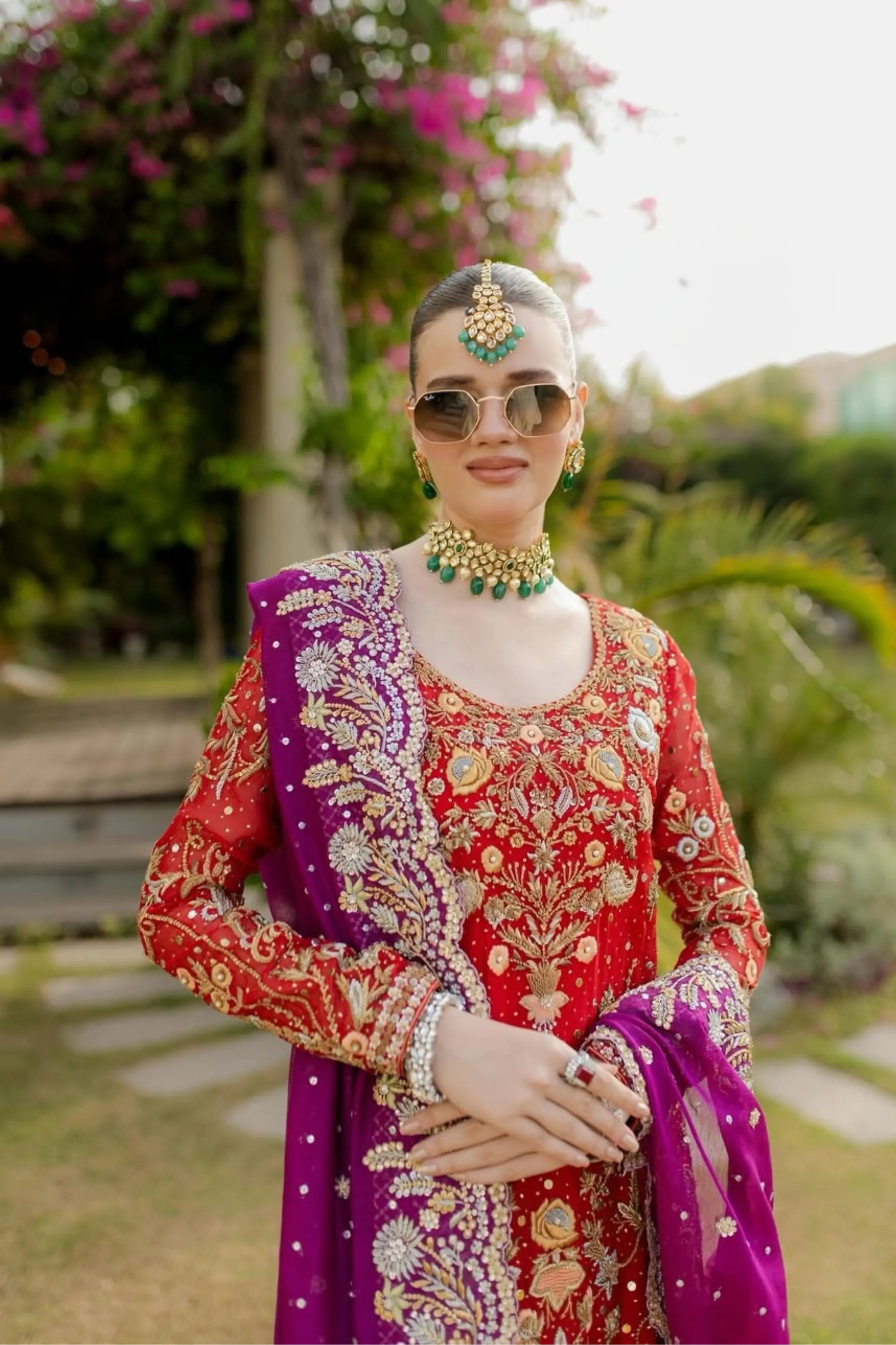 WOMEN WEARING LAHENGA RED AND ORANGE EASTERN WEDDING BRIDAL DRESS