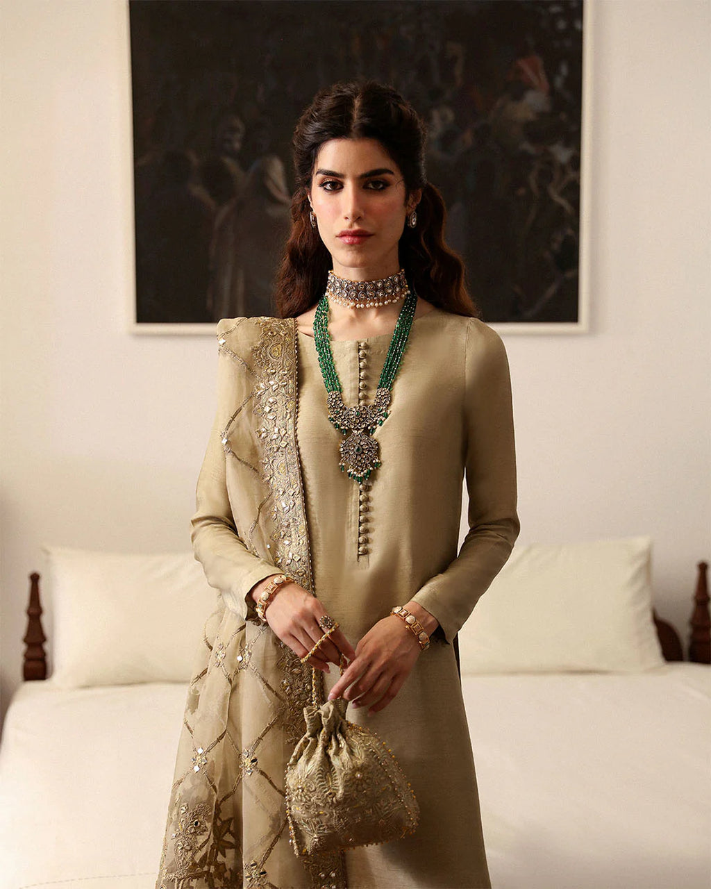 nainsi-refined-gold-festive-ensemble-with-buttoned-neckline-and-potli-bag-ayra