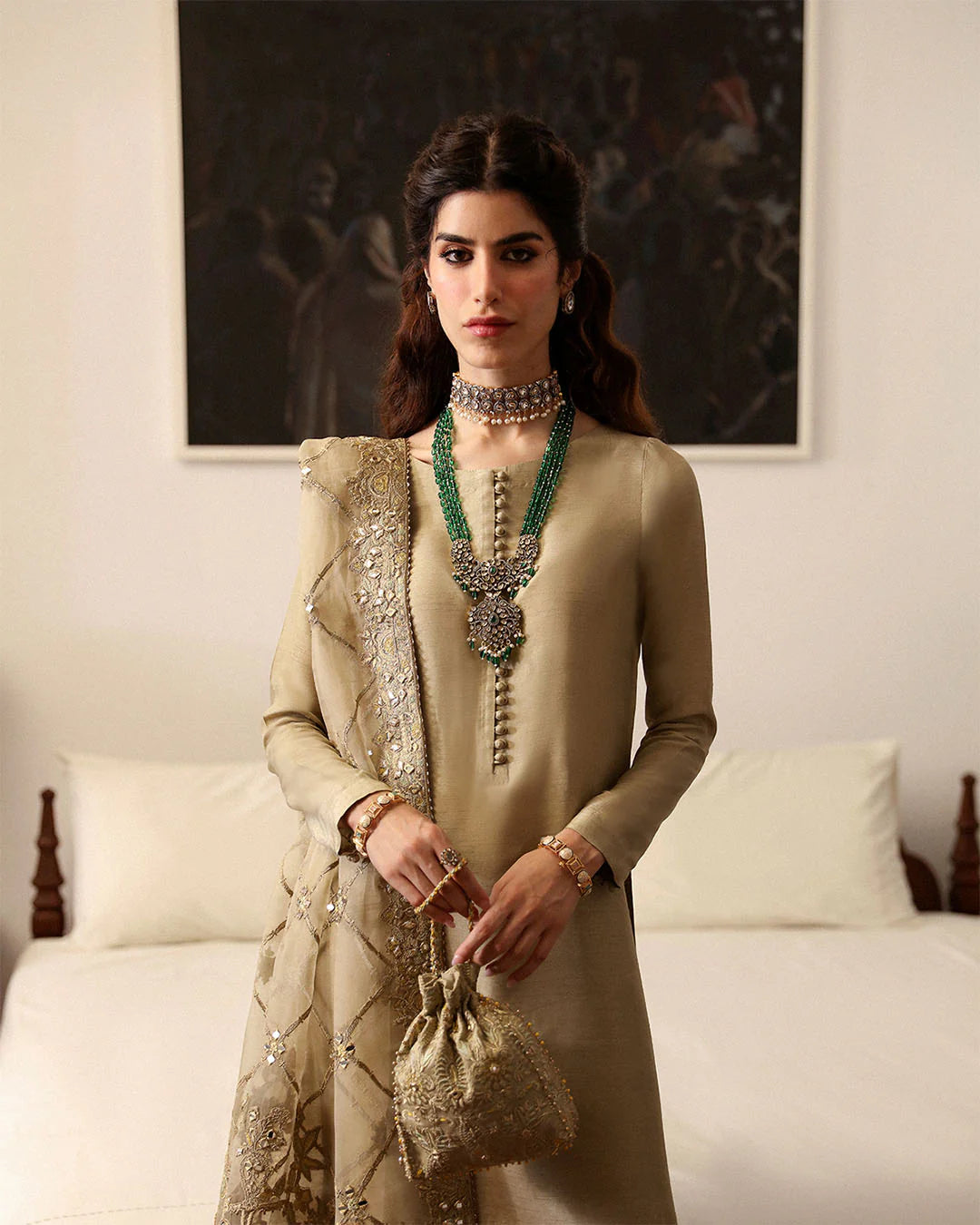 nainsi-refined-gold-festive-ensemble-with-buttoned-neckline-and-potli-bag-ayra