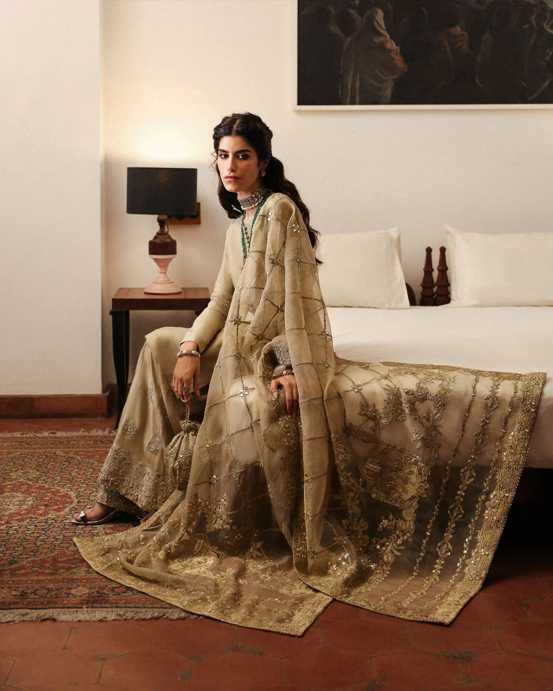 nainsi-intricate-gota-and-resham-embroidered-dupatta-spread-on-flared-pants-seated-view-ayra