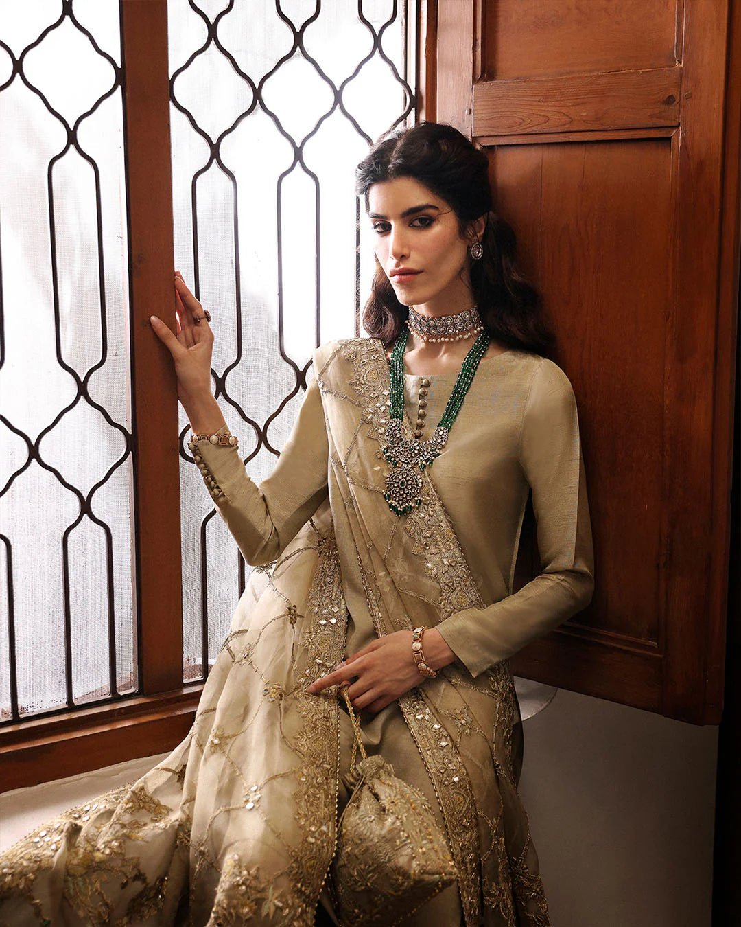 nainsi-consciously-crafted-gold-traditional-cut-and-craft-festive-wear-window-view-ayra