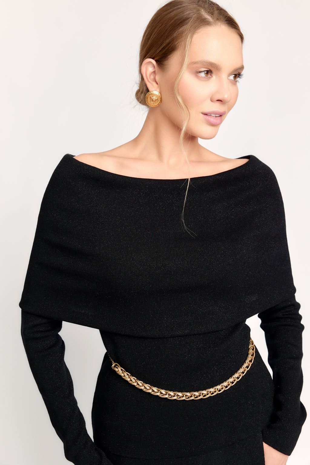 DEITY deep black fitted long-sleeve shirt with an architectural off-the-shoulder neckline.
