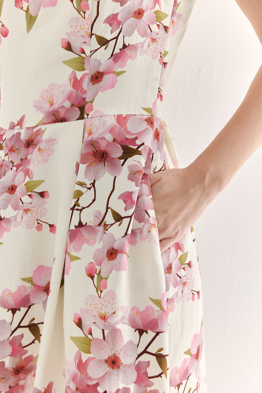 Dress with cherry blossom pattern on a white background
