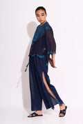 A navy blue Cotton Silk Chanderi shirt with teal geometric hand-cut appliqué on the front chest and back, featuring a pleated back design and scalloped edges.