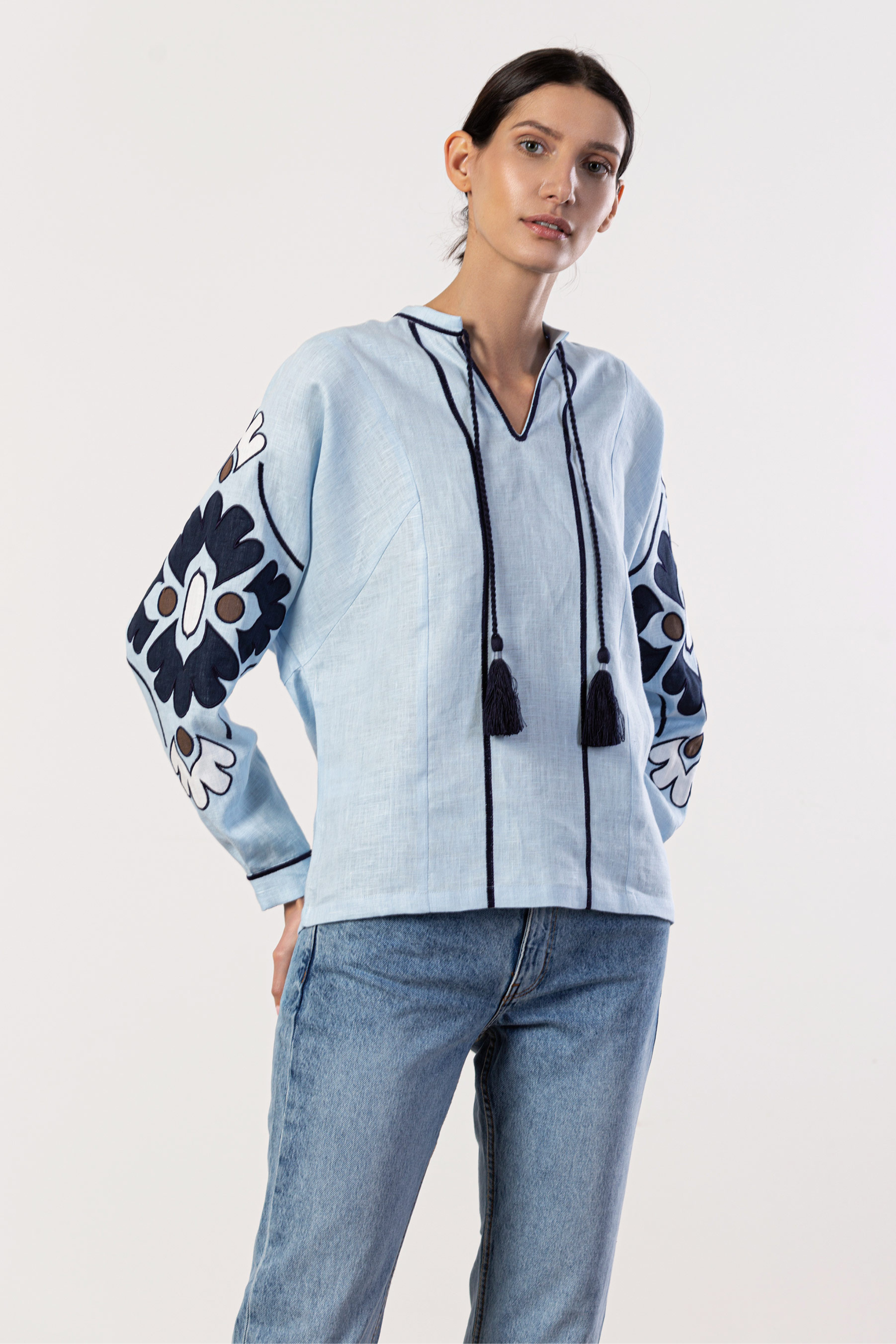 Beautiful Model wearing light blue embroidered women shirt