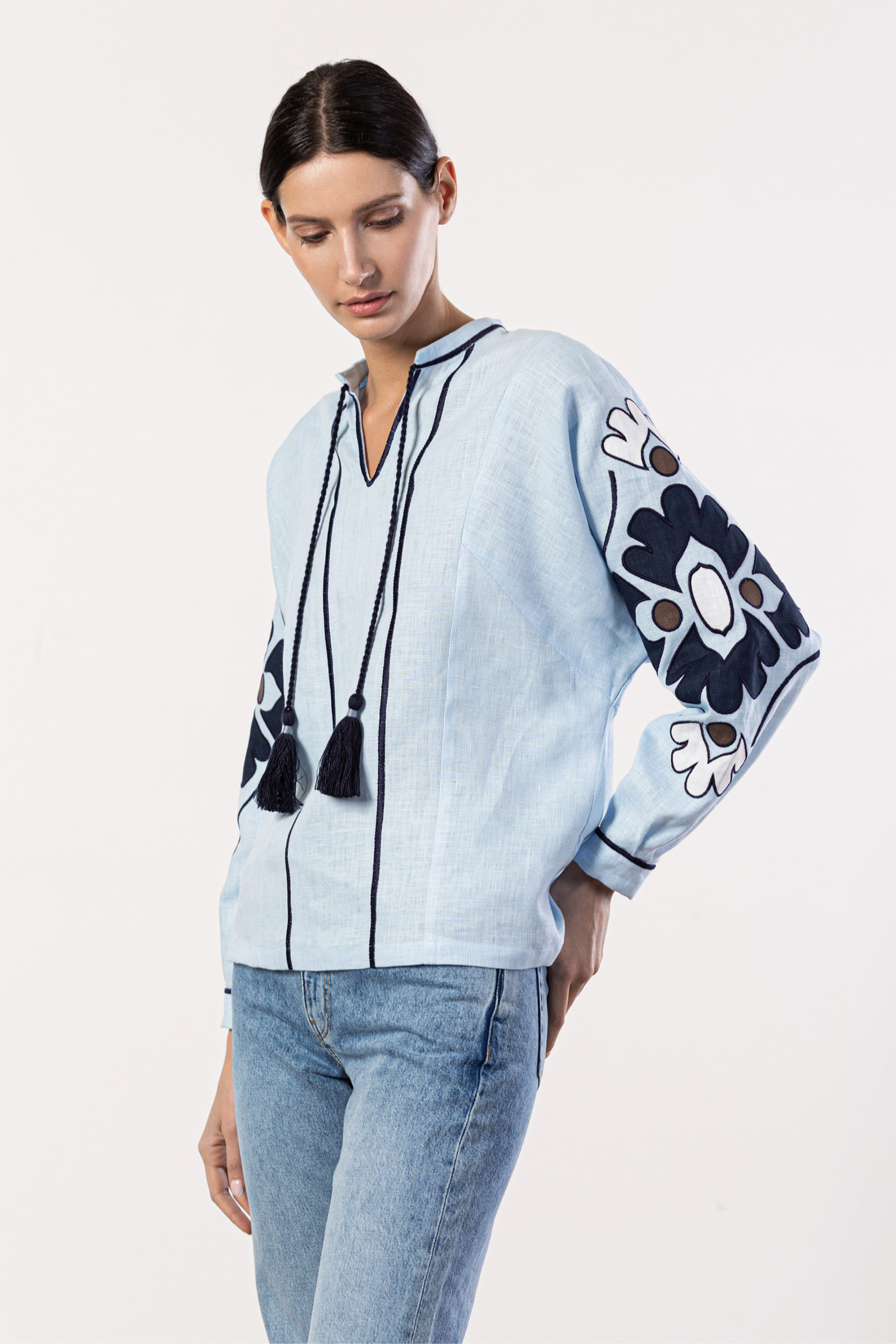 Beautiful Model wearing light blue embroidered women shirt
