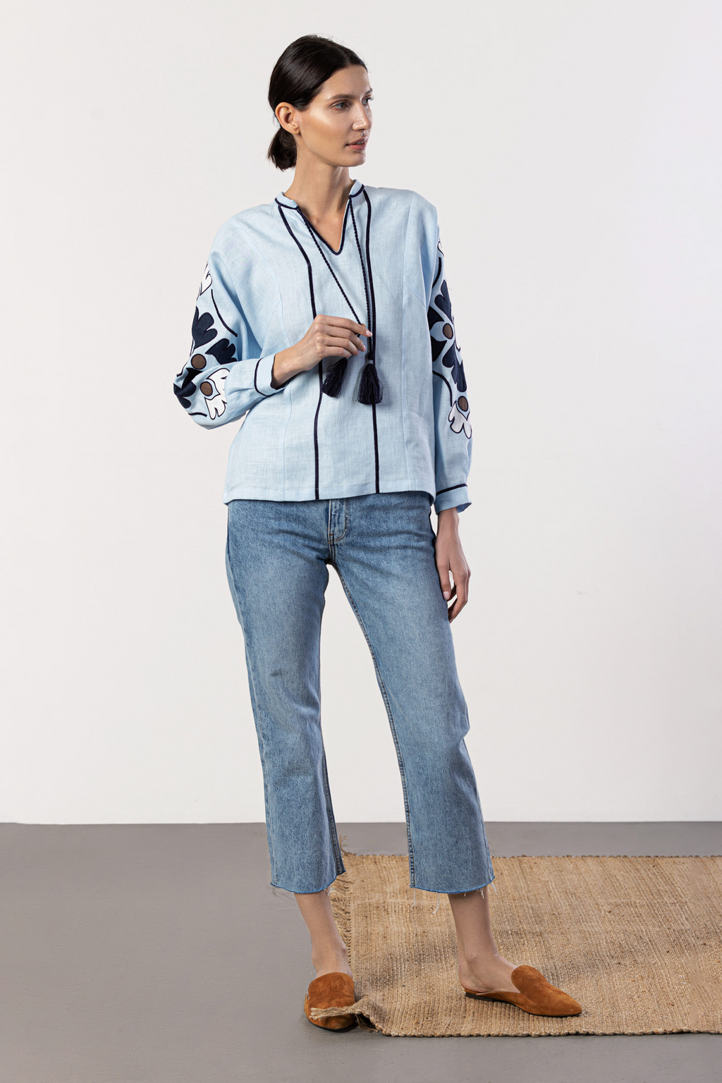 Beautiful Model wearing light blue embroidered women shirt