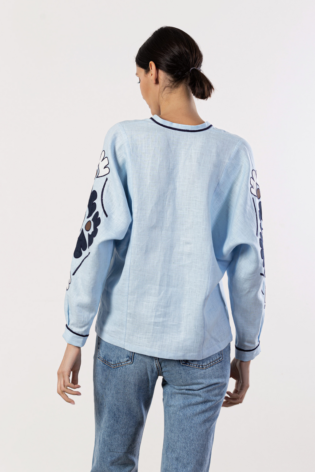 Beautiful Model wearing light blue embroidered women shirt