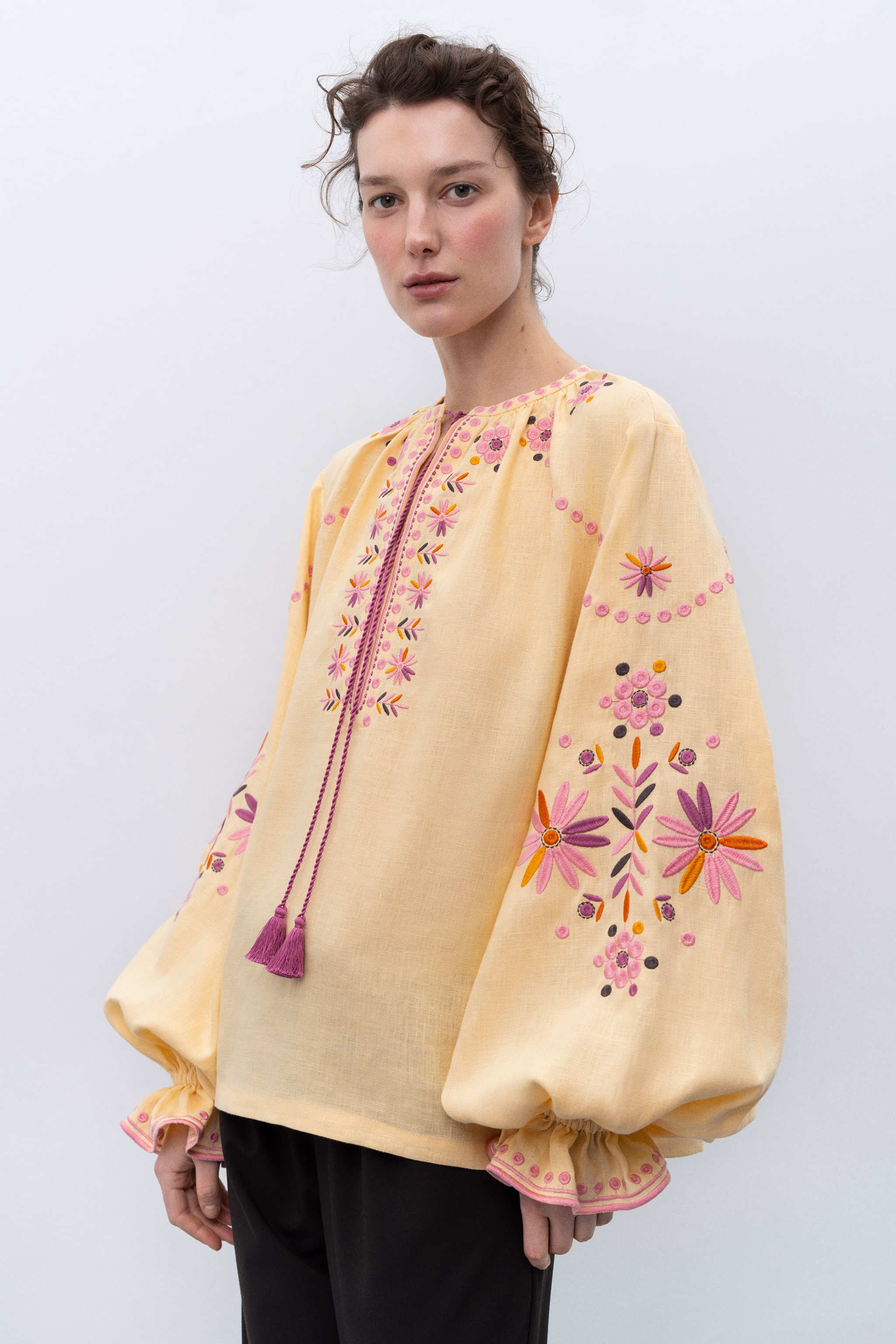 Beautiful Model wearing yellow embroidered women shirt