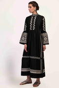 A floor-length black Chanderi dress featuring dramatic bell sleeves and vertical panels of ivory geometric hand-cut appliqué along the bodice and sleeves.