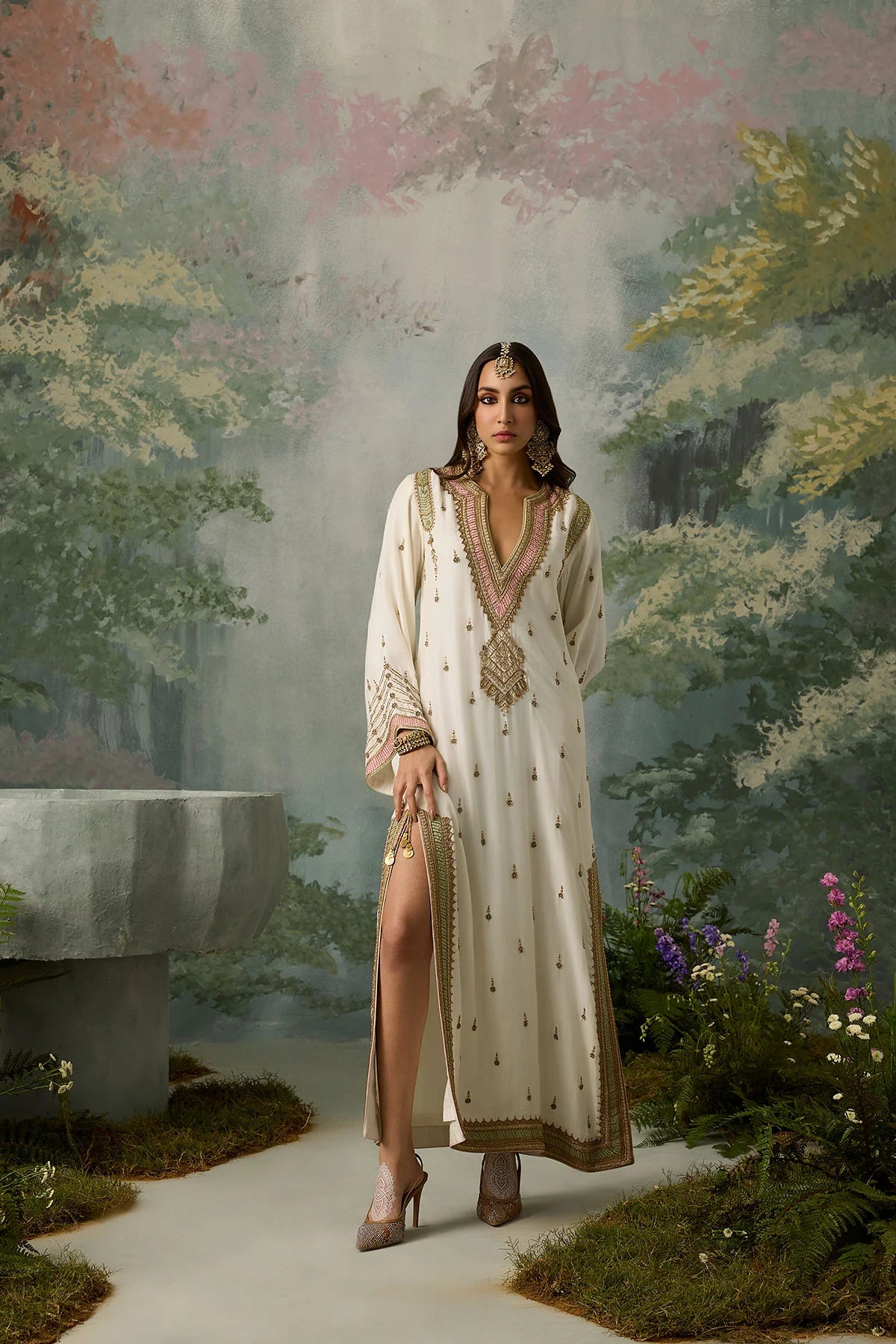zariyah-ivory-kaftan-featuring-statement-high-slits-with-gold-tassel-accents-ayra