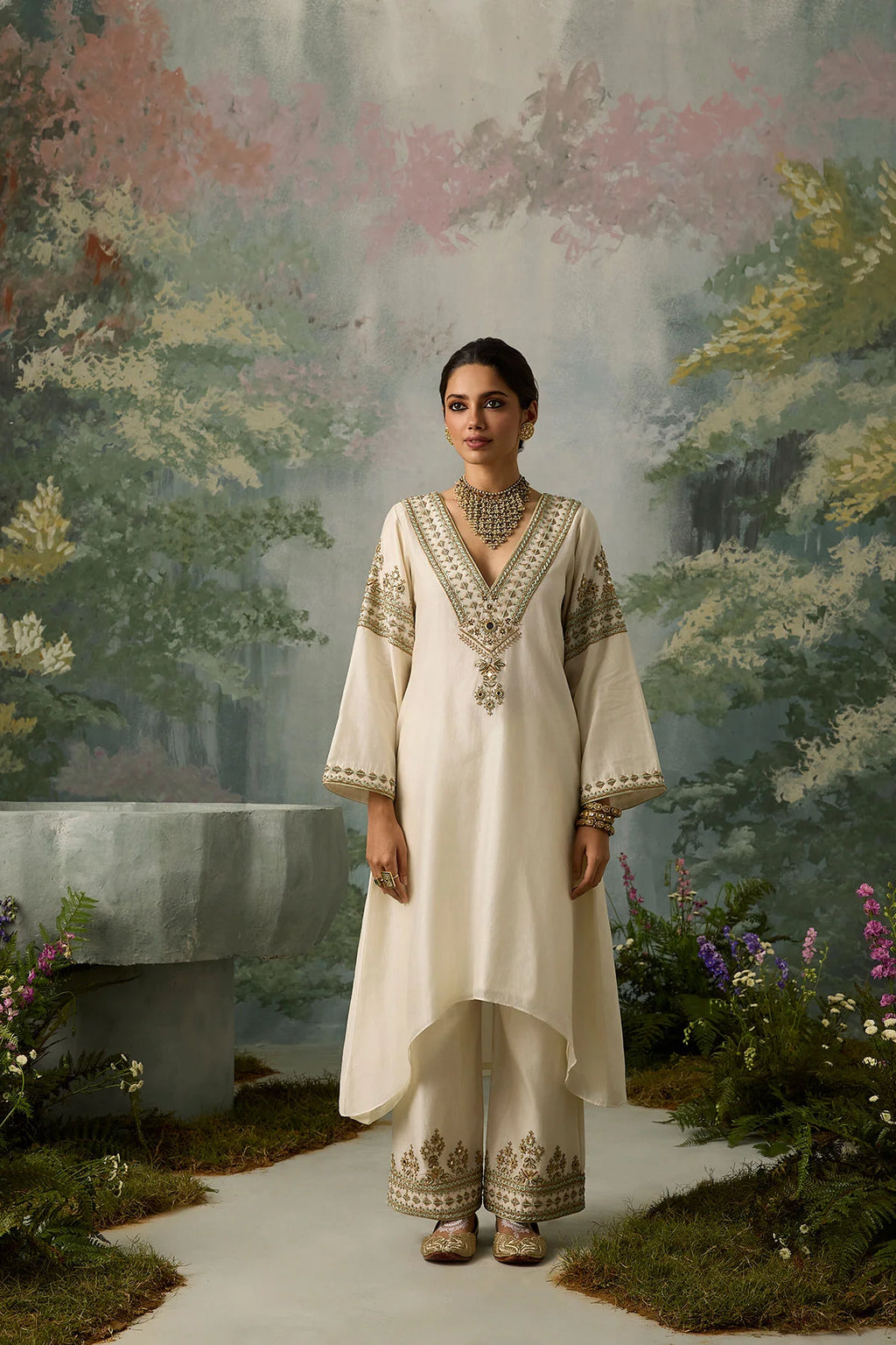 seher-ivory-high-low-silk-kurta-showing-plunging-v-neckline-and-flared-sleeves-ayra