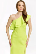 Woman wearing a bright green one-shoulder dress on a white background