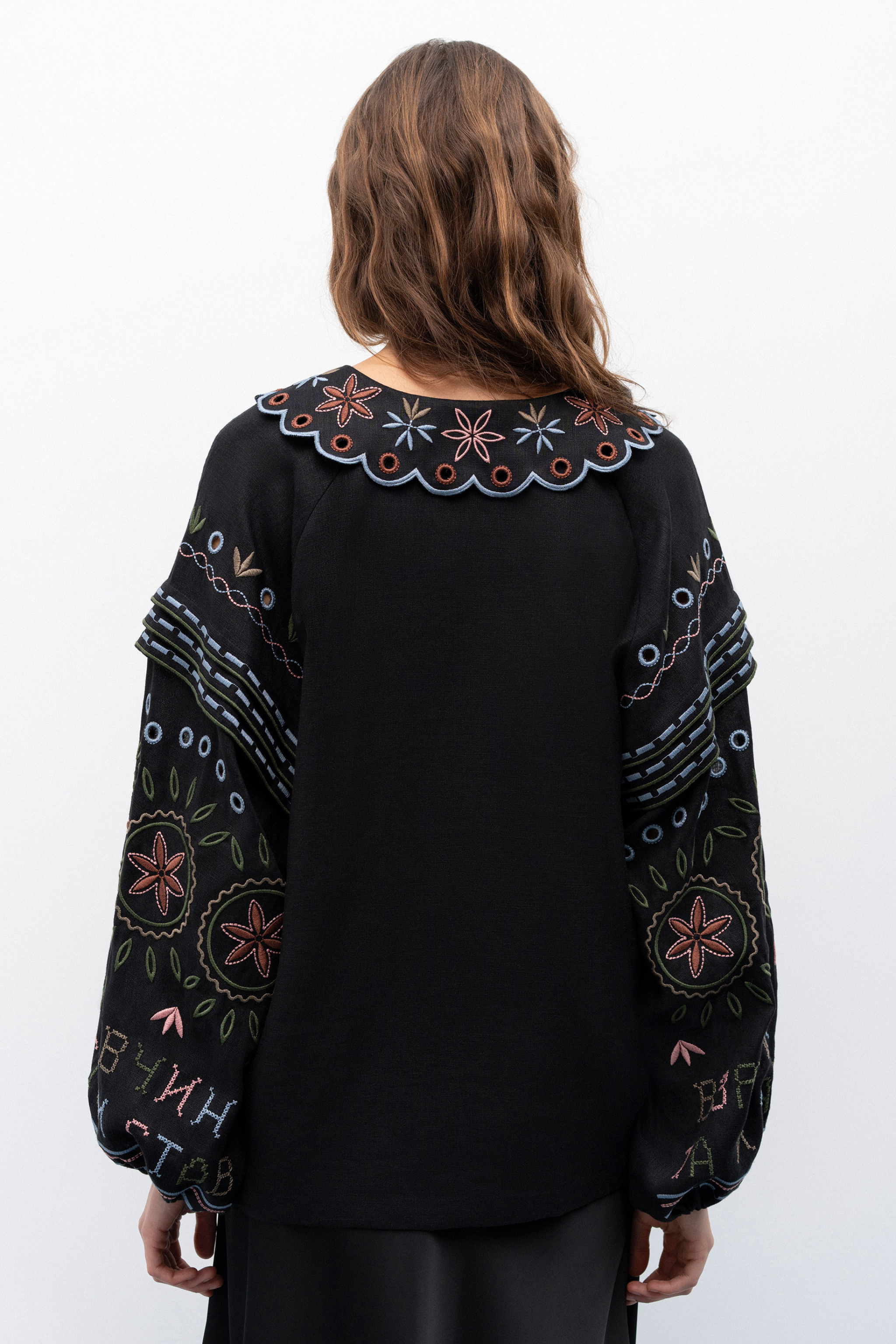 Beautiful women wearing Embroidered Women black Shirt