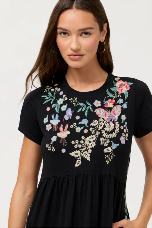 arva-luxury-resort-wear-dress-showing-intricate-multicolor-butterfly-and-floral-embroidery-ayra
